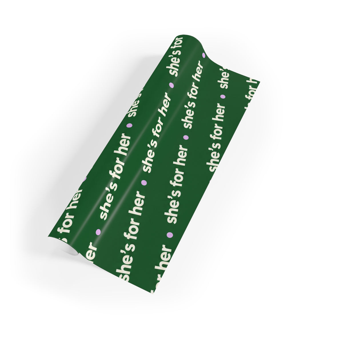 She’s For Her green wrapping paper roll with repeating lettering and hearts