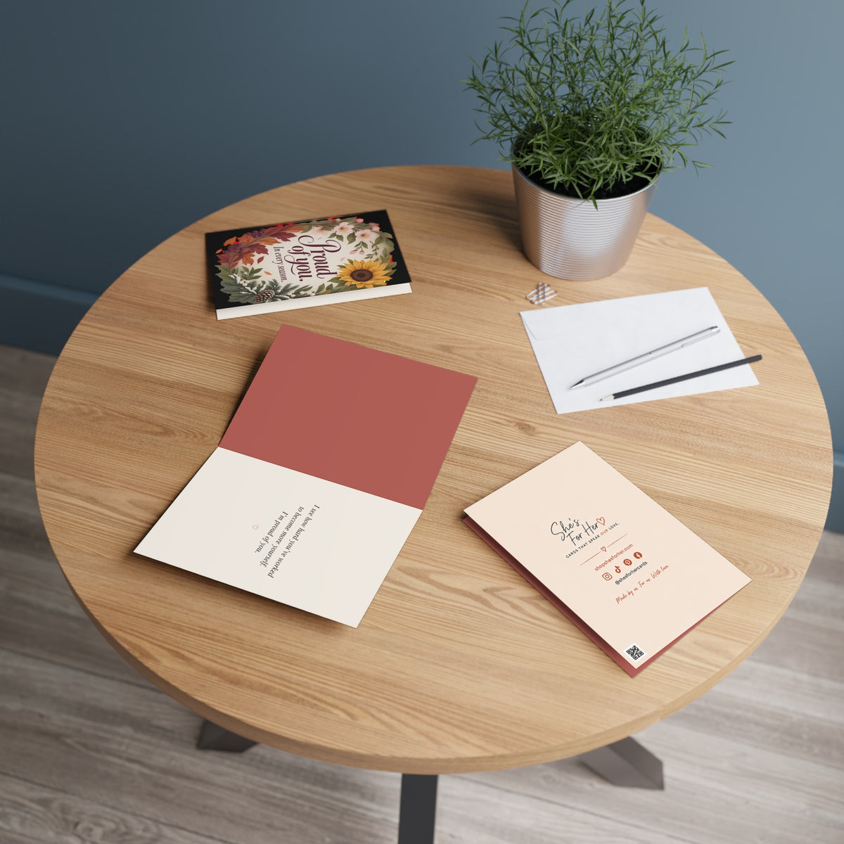 Greeting card in a setting: "Proud of You. In Every Season."  Encouragement Greeting Card